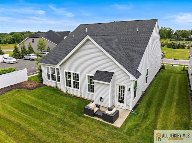 15 Galerie Ct, Monroe, NJ 08831 - back of property with roof with shingles, an outdoor hangout area, and a patio