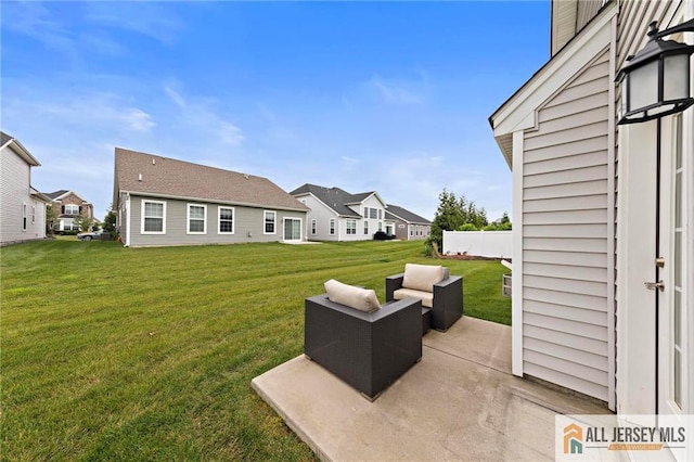 15 Galerie Ct, Monroe, NJ 08831 - view of green lawn featuring a patio, a residential view, and an outdoor living space
