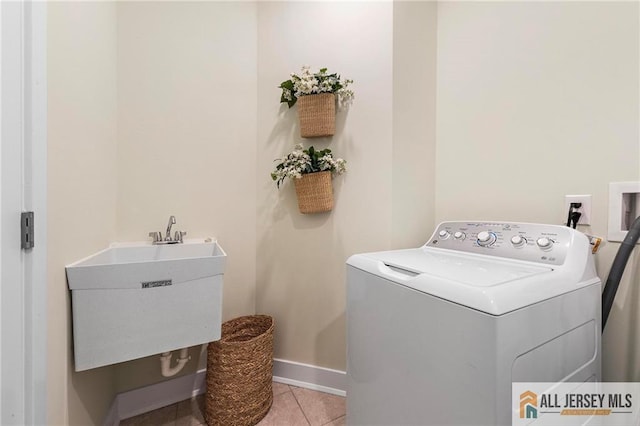 15 Galerie Ct, Monroe, NJ 08831 - washroom featuring washer / clothes dryer and light tile patterned flooring