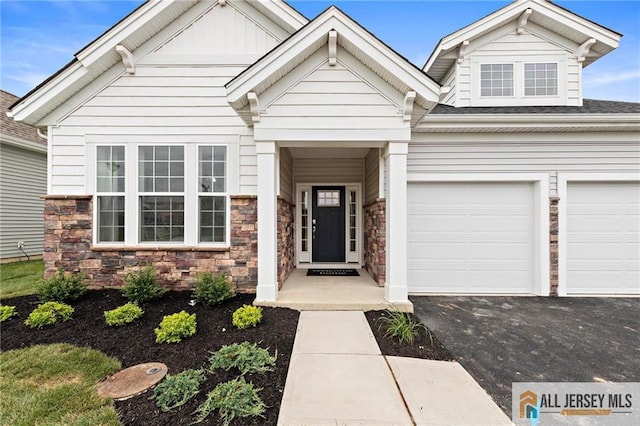 15 Galerie Ct, Monroe, NJ 08831 - craftsman inspired home featuring asphalt driveway, stone siding, and board and batten siding