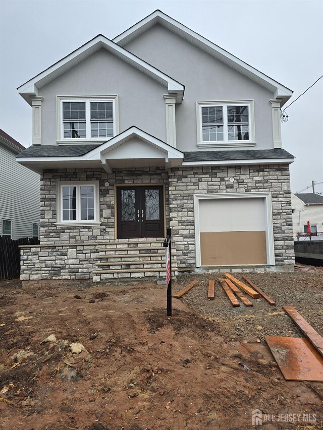 view of front property featuring a garage