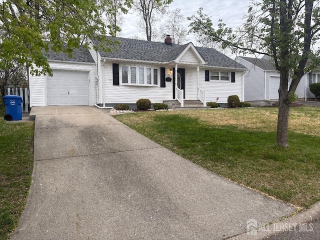 ranch-style home featuring concrete driveway, a chimney, a front lawn, and a garage