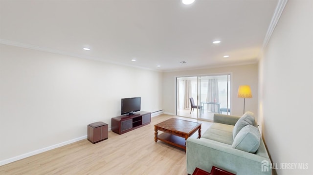 living room featuring ornamental molding, light wood-type flooring, a baseboard heating unit, and recessed lighting