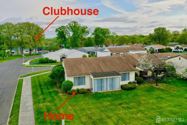birds eye view of property featuring a residential view