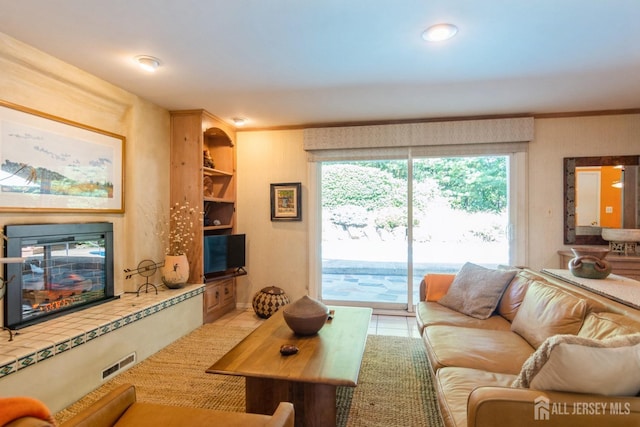 tiled living room with crown molding