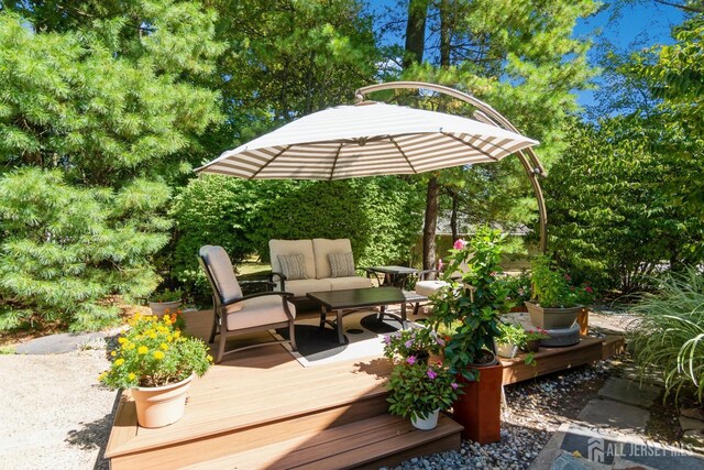 deck with outdoor lounge area