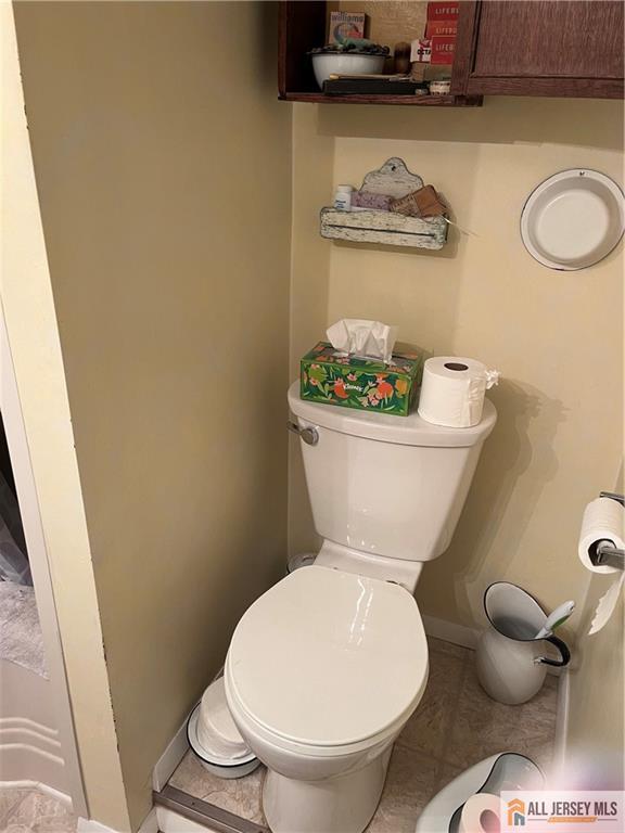 107 Readington Rd, Readington, NJ 08889 - half bath featuring toilet and tile patterned floors