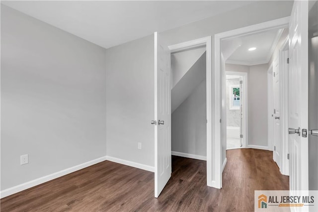 1092 Woodruff St, Iselin, NJ 08830 - unfurnished bedroom featuring wood finished floors, baseboards, and ornamental molding