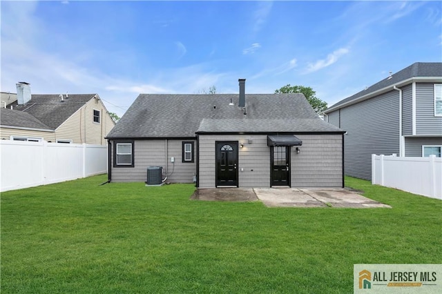 1092 Woodruff St, Iselin, NJ 08830 - back of house with central air condition unit, a patio, and roof with shingles