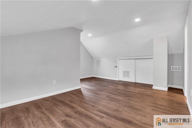1092 Woodruff St, Iselin, NJ 08830 - bonus room with vaulted ceiling, baseboards, wood finished floors, and recessed lighting