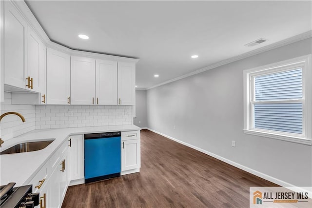1092 Woodruff St, Iselin, NJ 08830 - kitchen featuring dishwasher, a sink, decorative backsplash, light countertops, and ornamental molding