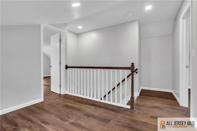 1092 Woodruff St, Iselin, NJ 08830 - corridor with an upstairs landing, baseboards, wood finished floors, and recessed lighting