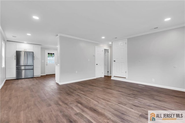 1092 Woodruff St, Iselin, NJ 08830 - unfurnished living room with crown molding, recessed lighting, baseboards, and dark wood-style flooring