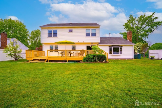 5 Wetherhill Way S, Brunswick, NJ 08810 - back of house with a wooden deck and a chimney