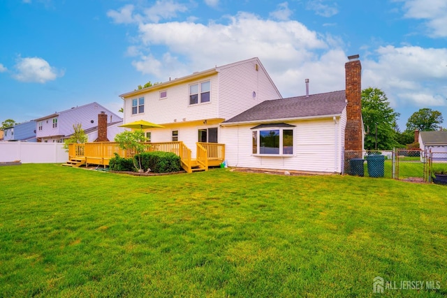 5 Wetherhill Way S, Brunswick, NJ 08810 - rear view of property featuring a gate, a deck, and a chimney
