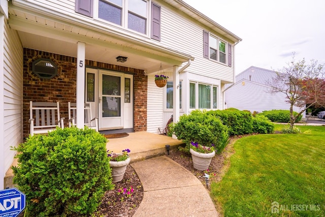 5 Wetherhill Way S, Brunswick, NJ 08810 - doorway to property with a porch and a lawn