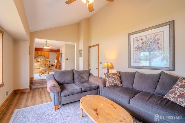 5 Wetherhill Way S, Brunswick, NJ 08810 - living room featuring light wood-style floors, lofted ceiling, ceiling fan, and baseboards