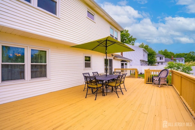 5 Wetherhill Way S, Brunswick, NJ 08810 - wooden terrace with outdoor dining space