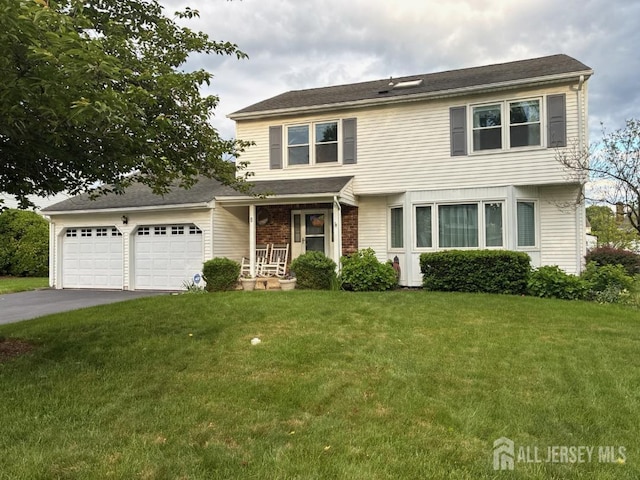 5 Wetherhill Way S, Brunswick, NJ 08810 - view of front of property featuring an attached garage, driveway, a front lawn, covered porch, and brick siding