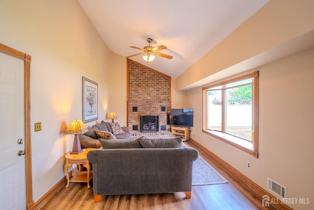 5 Wetherhill Way S, Brunswick, NJ 08810 - living room featuring lofted ceiling, light wood-style flooring, ceiling fan, a fireplace, and baseboards