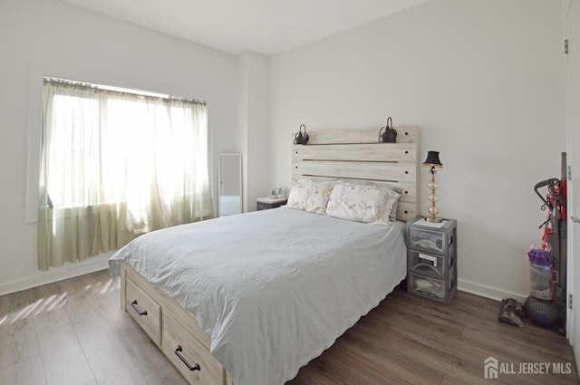 1 Carriage City Plz Unit 509, Rahway, NJ 07065 - bedroom with wood finished floors and baseboards