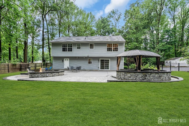 230 New Rd, South Brunswick, NJ 08852 - rear view of property featuring a fire pit, a gazebo, and a patio area