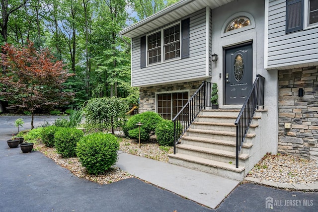 230 New Rd, South Brunswick, NJ 08852 - view of exterior entry with stone siding