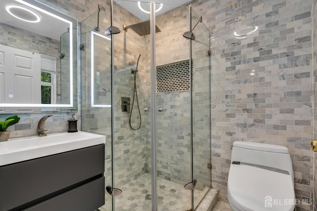 230 New Rd, South Brunswick, NJ 08852 - full bathroom featuring tile walls, vanity, and a shower stall