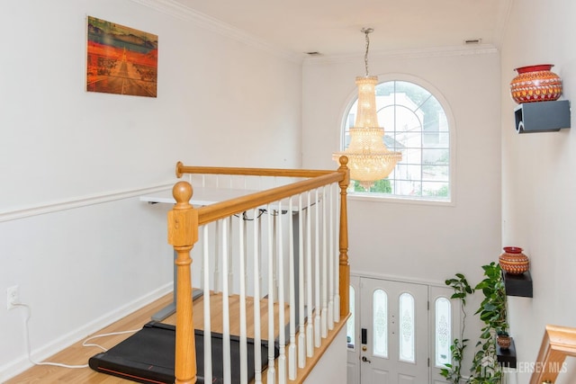 63 Clinton Ave, Keasbey, NJ 08832 - staircase with wood finished floors and ornamental molding