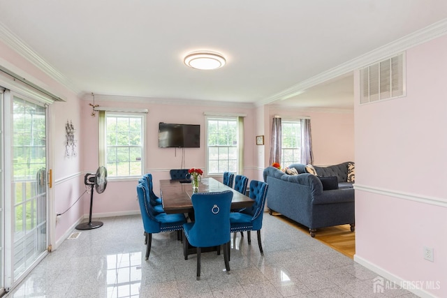 63 Clinton Ave, Keasbey, NJ 08832 - dining room with plenty of natural light, granite tiled floors, and crown molding