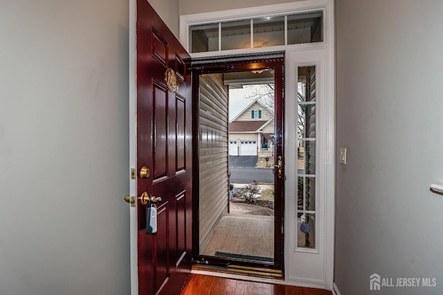 entrance foyer with dark wood finished floors