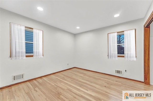 440 E Ave, Sewaren, NJ 07077 - spare room with wood finished floors and recessed lighting