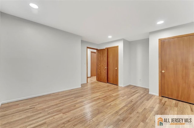 440 E Ave, Sewaren, NJ 07077 - unfurnished bedroom featuring light wood-type flooring and recessed lighting