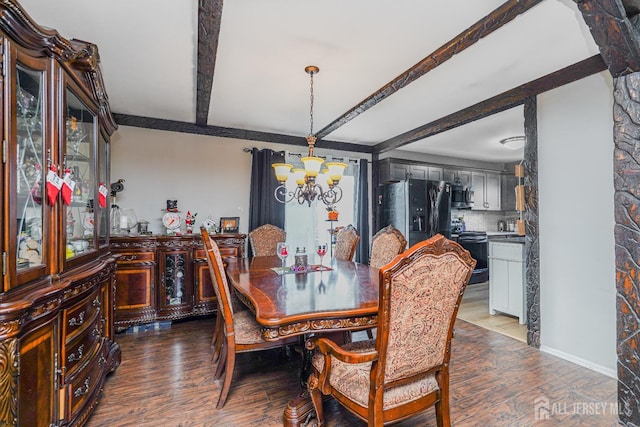 dining room featuring dark wood-style floors, a chandelier, beam ceiling, and baseboards