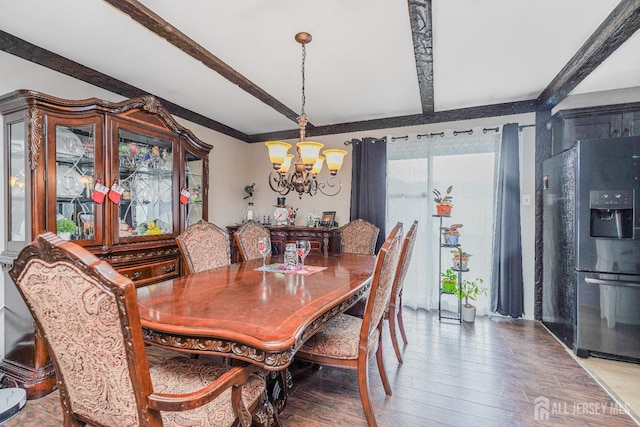 dining room with wood finished floors, beam ceiling, and a notable chandelier