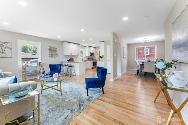 226 Schussler St, Sayreville, NJ 08879 - living room featuring light wood-style flooring and recessed lighting