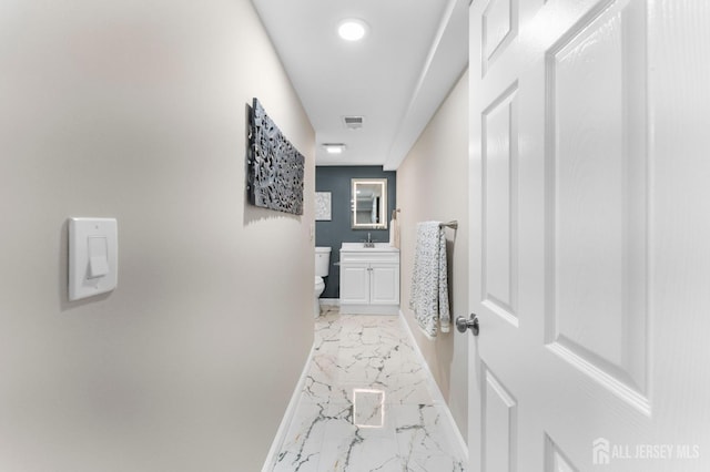 226 Schussler St, Sayreville, NJ 08879 - hall with light marble finish flooring and recessed lighting