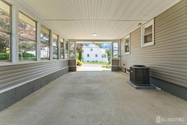 226 Schussler St, Sayreville, NJ 08879 - view of patio / terrace featuring an attached carport
