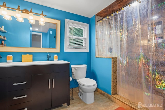 full bathroom with toilet, curtained shower, vanity, and tile patterned floors