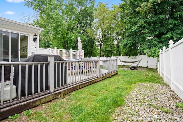 view of yard with a deck