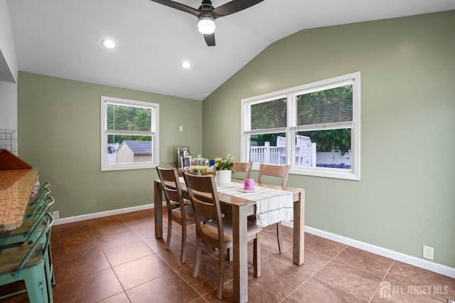 tiled dining area featuring vaulted ceiling, ceiling fan, recessed lighting, and baseboards