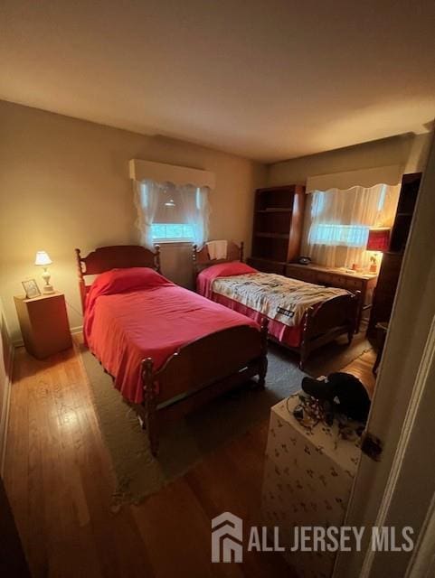 1436 Thomas Ave, North Brunswick, NJ 08902 - bedroom featuring wood finished floors