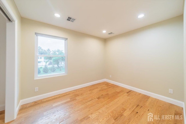 17 Fourth St, Hillsborough, NJ 08821 - spare room featuring light wood finished floors, baseboards, and recessed lighting