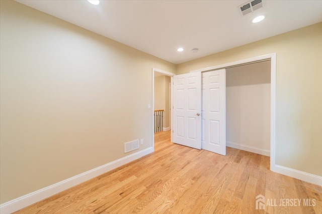 17 Fourth St, Hillsborough, NJ 08821 - unfurnished bedroom featuring baseboards, wood finished floors, recessed lighting, and a closet