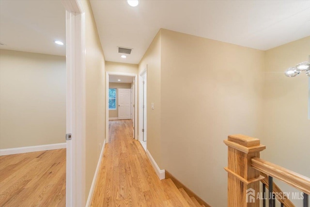 17 Fourth St, Hillsborough, NJ 08821 - corridor with an upstairs landing, light wood finished floors, recessed lighting, and baseboards