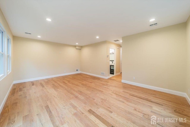 17 Fourth St, Hillsborough, NJ 08821 - unfurnished room featuring light wood-style floors, baseboards, and recessed lighting