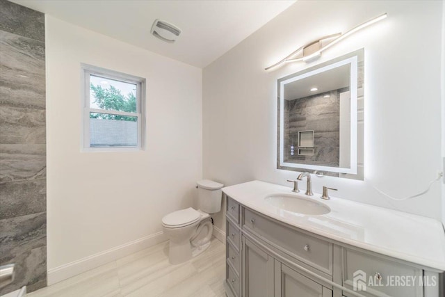 17 Fourth St, Hillsborough, NJ 08821 - full bathroom featuring baseboards, vanity, and toilet