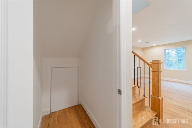17 Fourth St, Hillsborough, NJ 08821 - stairs featuring wood finished floors, recessed lighting, and baseboards