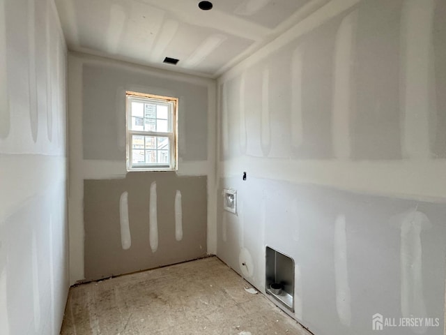 clothes washing area with laundry area and hookup for a washing machine