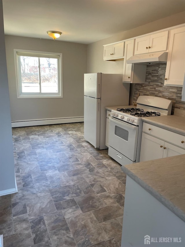 kitchen featuring under cabinet range hood, white cabinets, white appliances, and a baseboard radiator